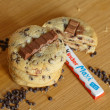 Discover the joy of surprise in every bite with our Kinder Chocolate Chip Cookie!